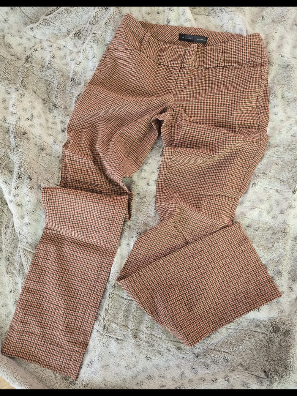 The limited Orange and Black Micro Houndstooth Stretch Pants